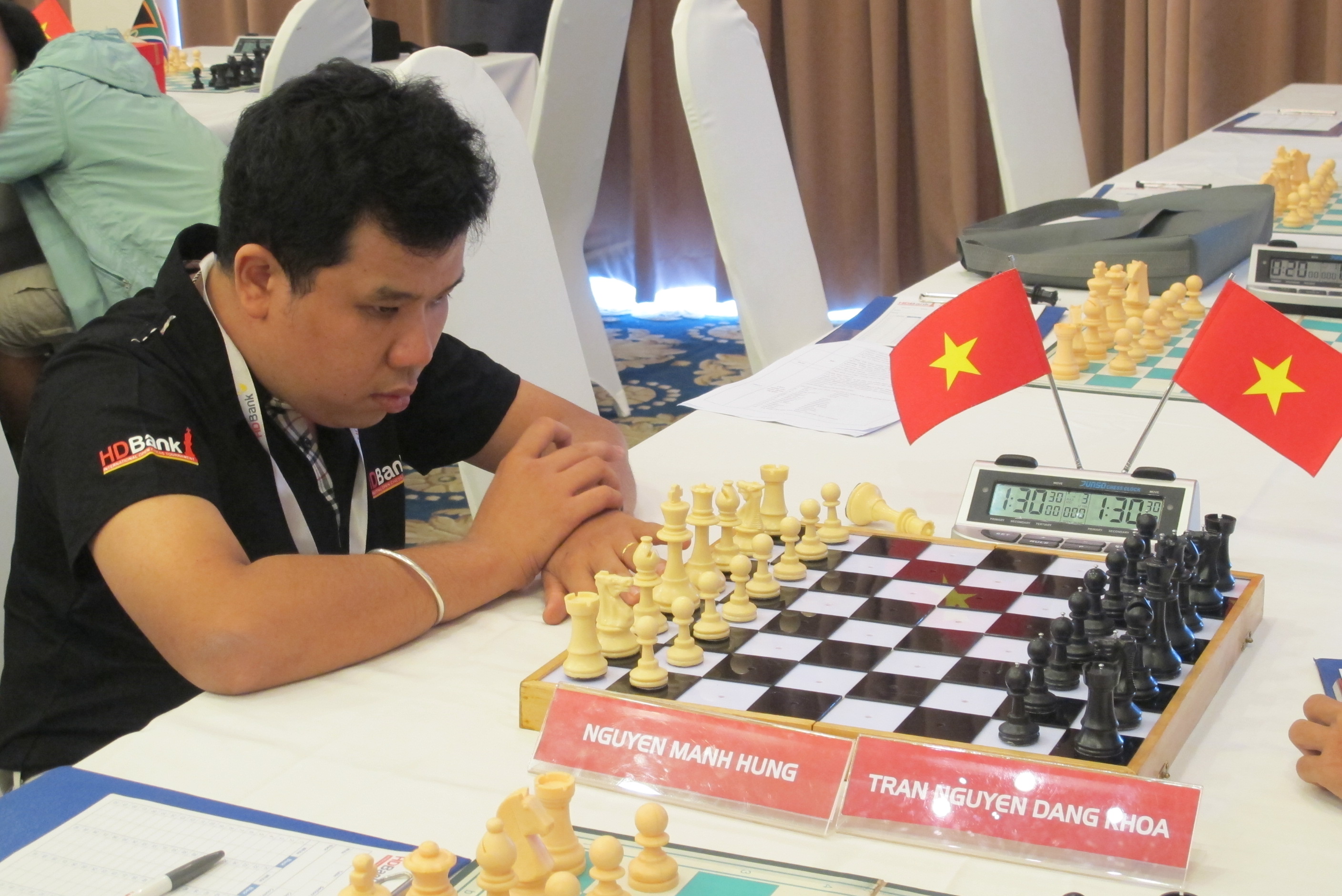 Nguyen Manh Hung competes in the HDBank international open chess tournament
