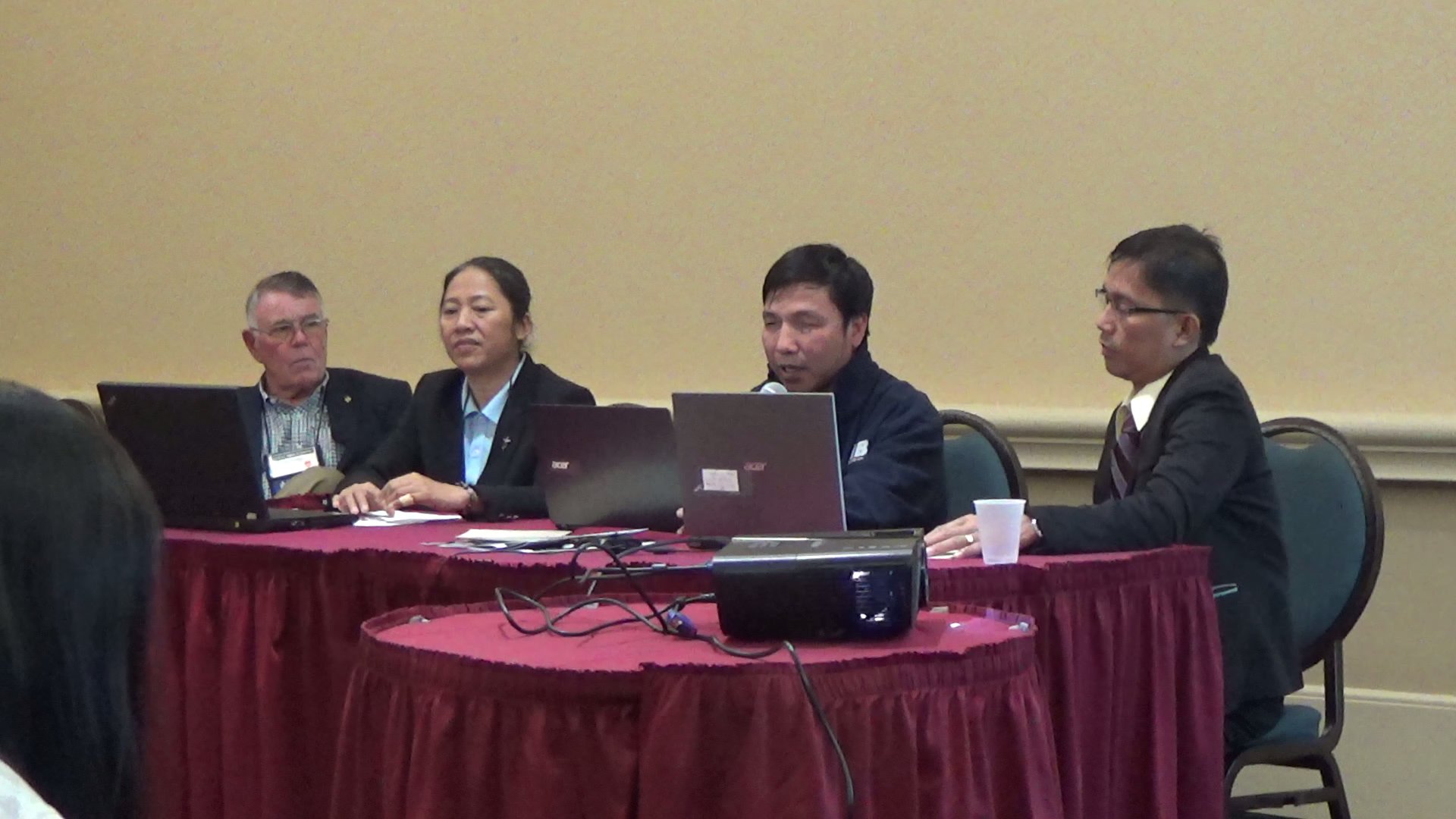 Phuc making presentation with the group of other country coordinators in Orlando